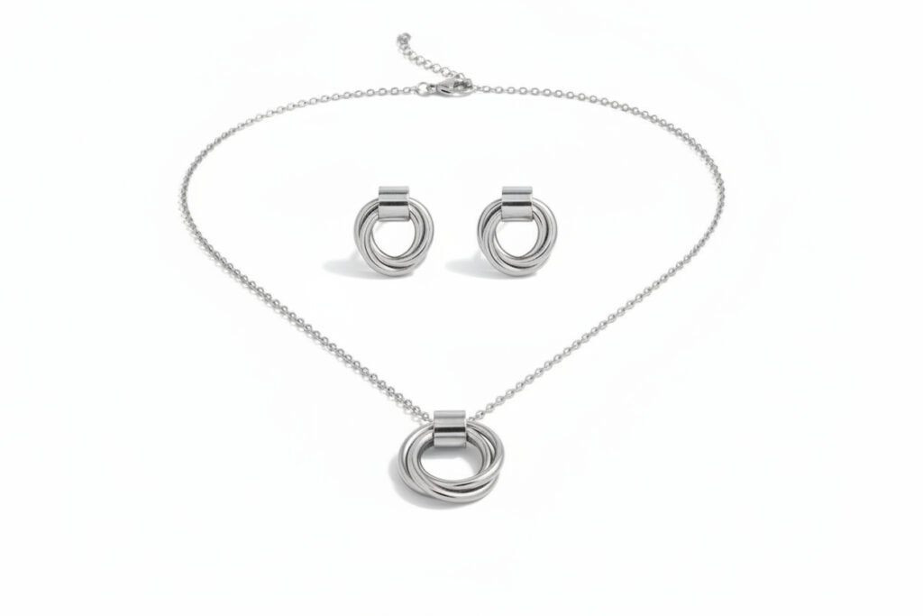 trilogy ring necklace and earring set silver