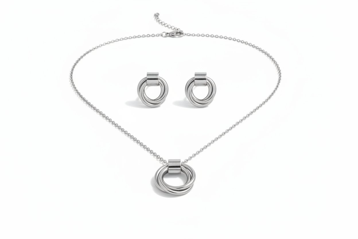 trilogy ring necklace and earring set silver
